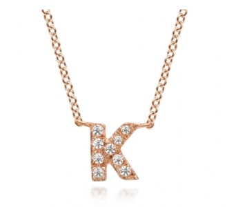 A rose gold “K” pendant necklace with diamond accents from Gabriel & Co.