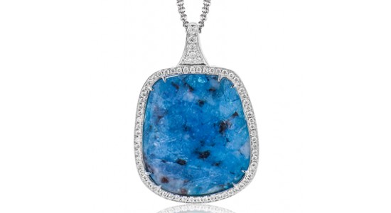a white gold opal pendant necklace featuring diamond accents